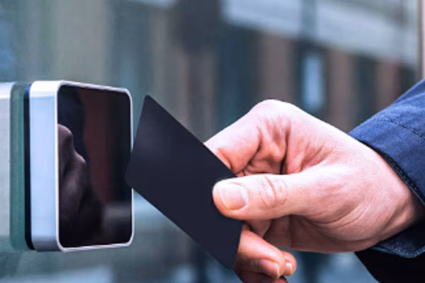 A hand holding a card